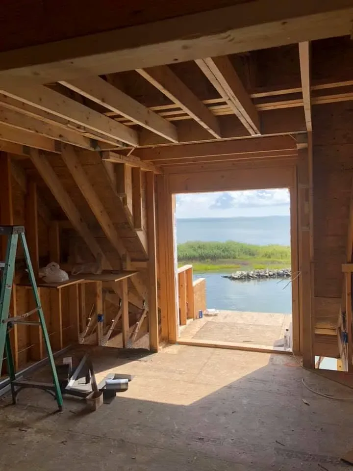 Framed wall opening looking out over the water
